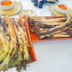 Calçotada junto al mar en La Cucanya